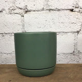 Cylinder with fitted saucer